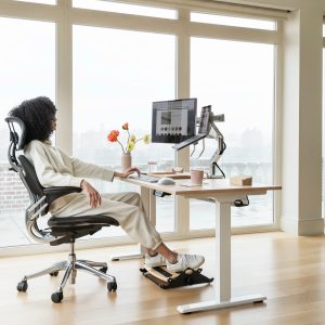 Humanscale eFloat Go 2.0 Sit-Stand Desk in a workspace