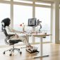 Humanscale eFloat Go 2.0 Sit-Stand Desk in a workspace